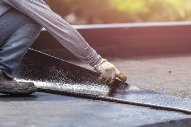 Professional Emergency Waterproofing technician working in Marion, MI